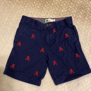 Boden size 7 boys shorts - blue with red skulls